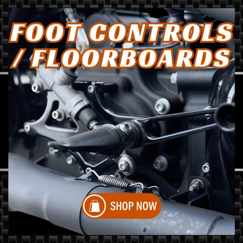 "Shop Now" button overlaid on an image of a Harley-Davidson focusing on the foot controls, including the brake pedal, shifter pedal, and pegs, leading users to all foot control and floorboard products on the site.